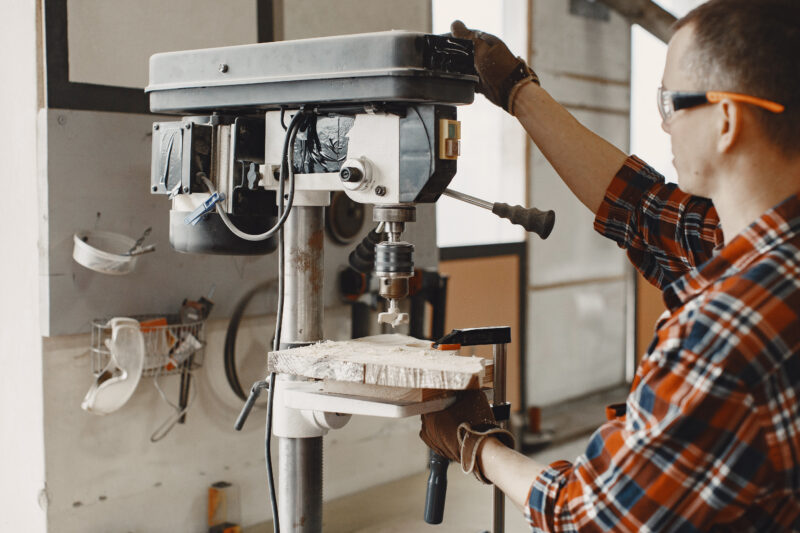 Carpenter working with circular saw